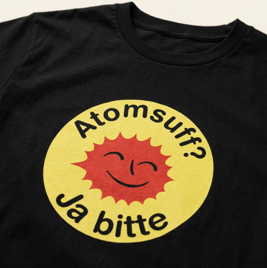 Detailaufnahme des Atomsuff? Ja bitte Prints mit lachender roter Sonne auf gelbem Kreis